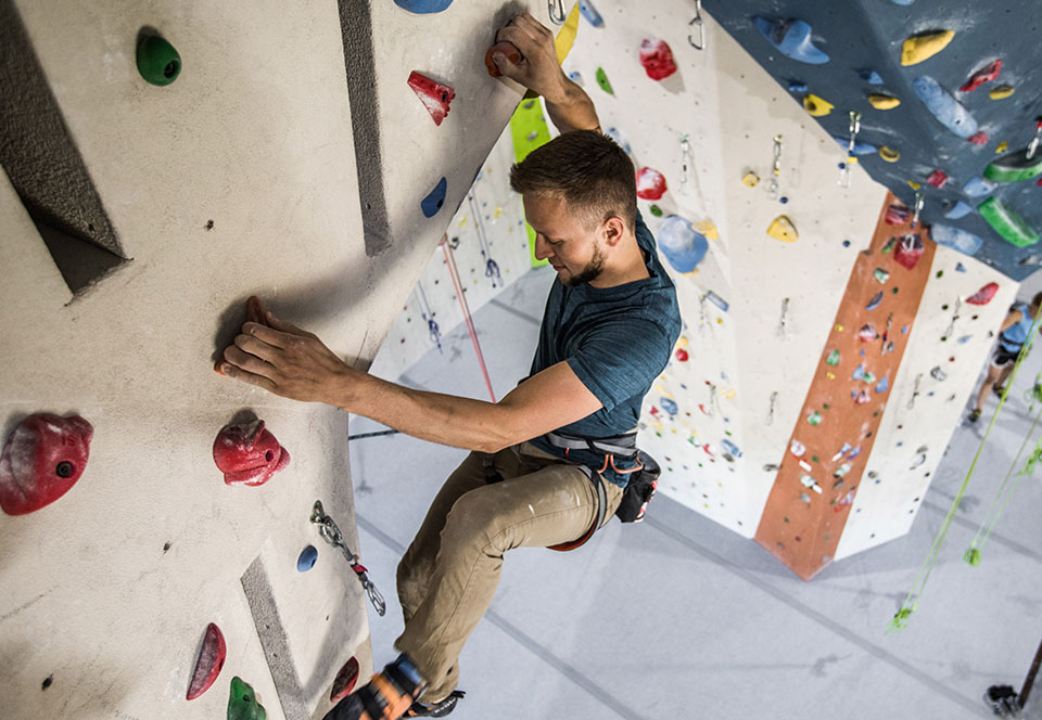 Man climbing wall