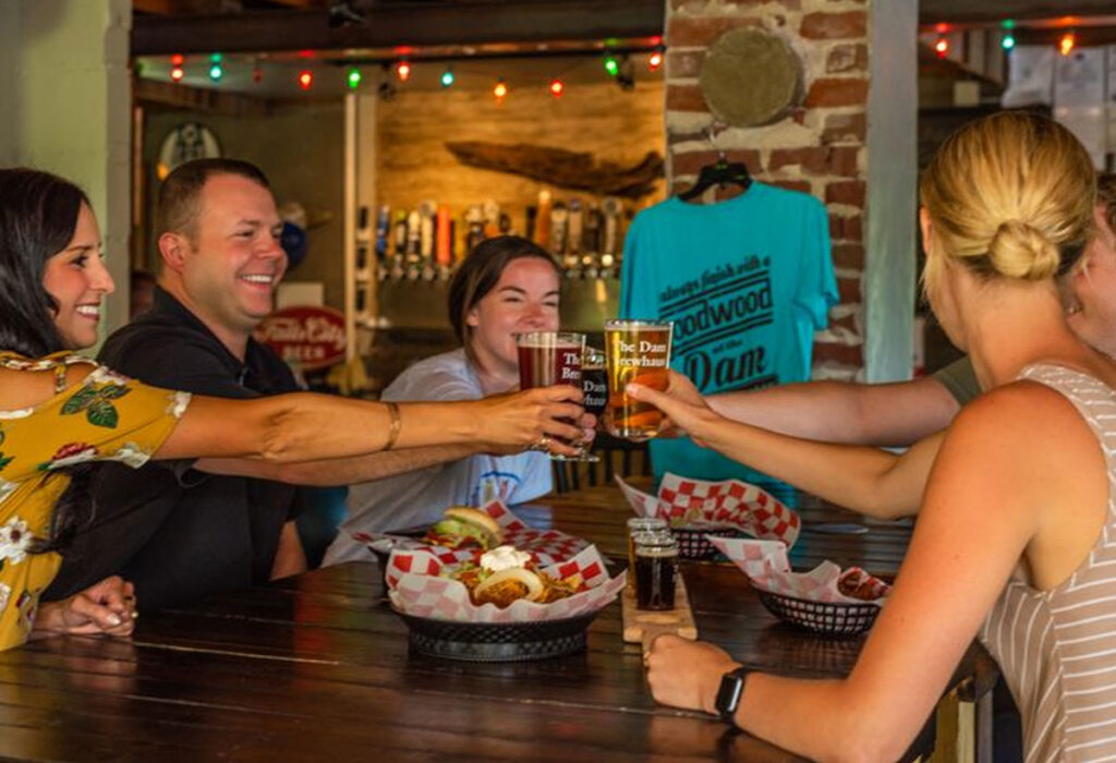 Friends toasting drinks at restaurant